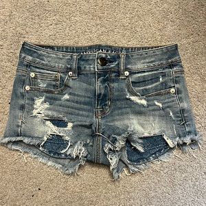 Jean shorts with decorative knit pockets
